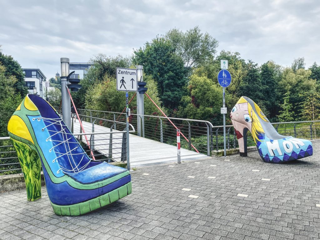 Two shoe sculptures