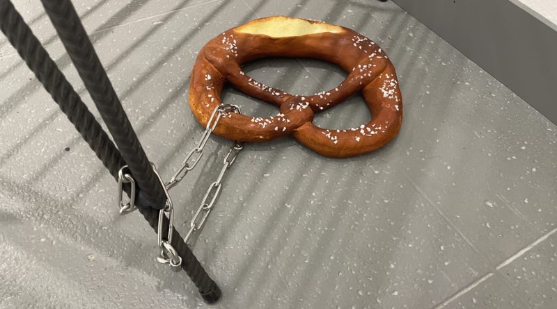 Pretzel chained to a chair